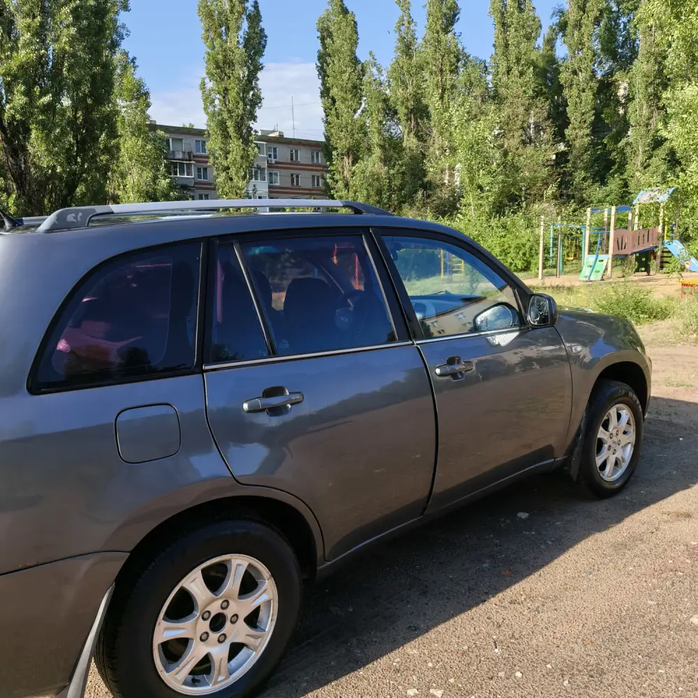 Chery Tiggo T11 — фото 4 из 6