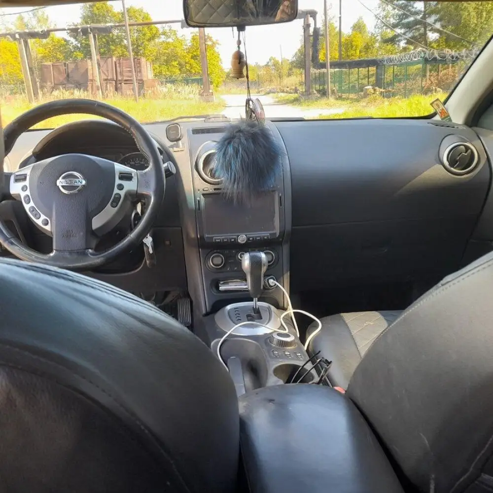Nissan Qashqai+2 — фото 4 из 6