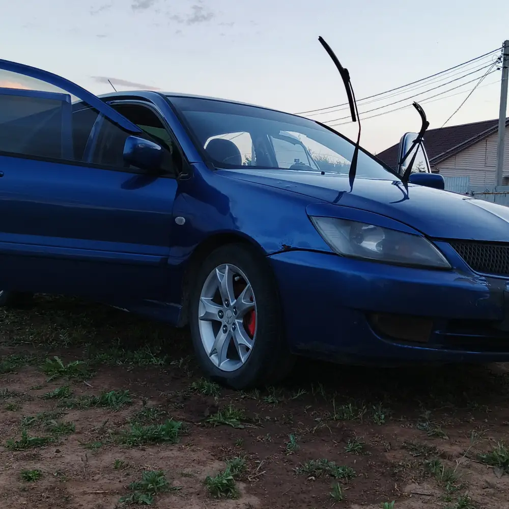 Mitsubishi Lancer — фото 5 из 6