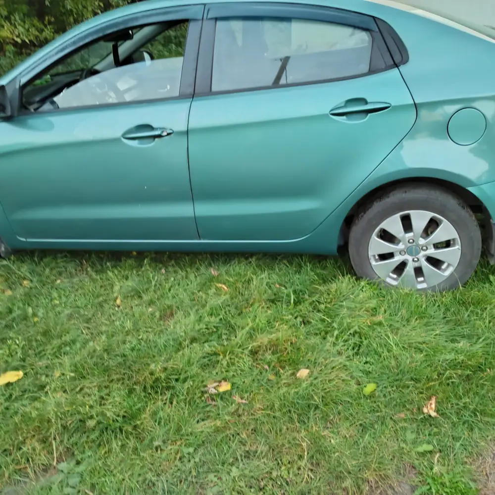 Kia Rio — фото 5 из 6