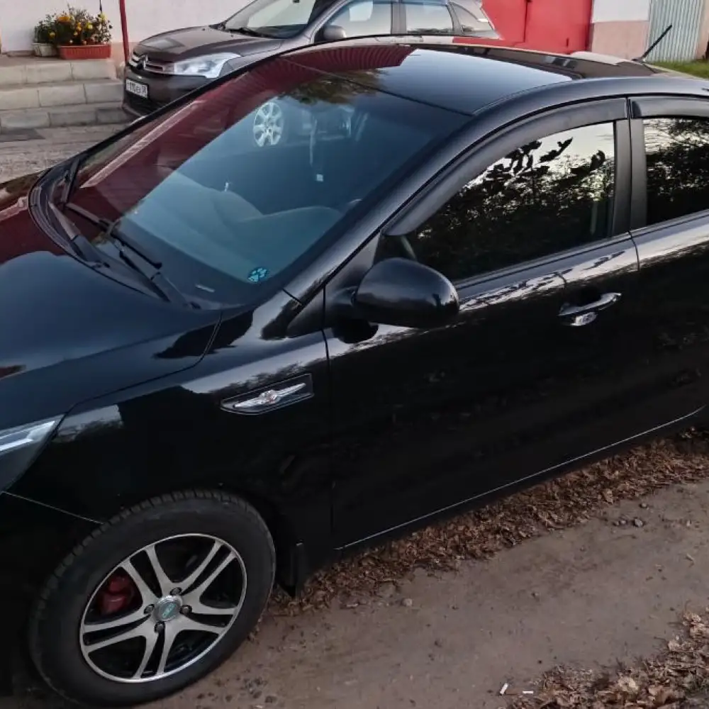 Kia Rio — фото 5 из 6