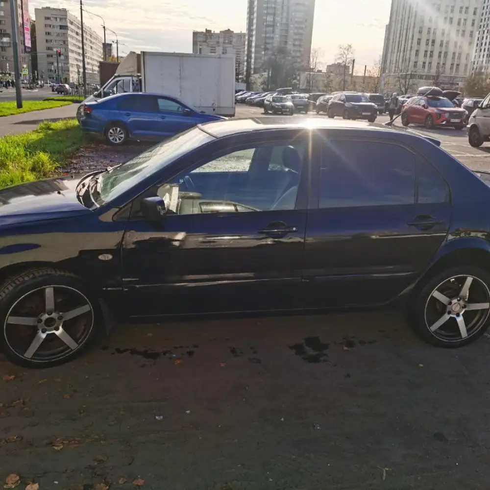 Mitsubishi Lancer — фото 4 из 6
