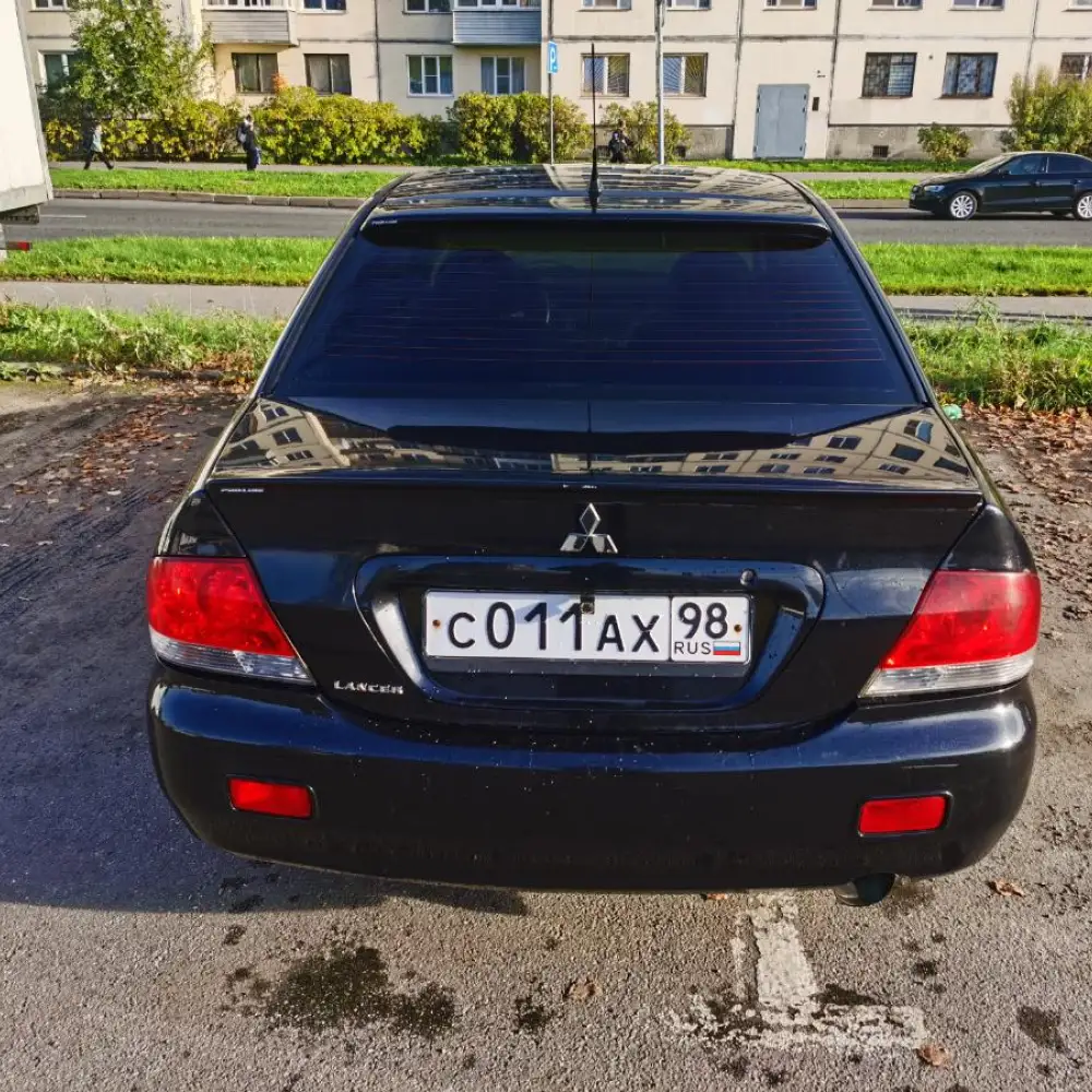 Mitsubishi Lancer — фото 5 из 6