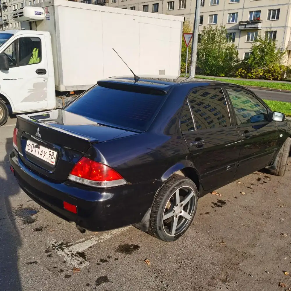 Mitsubishi Lancer — фото 6 из 6